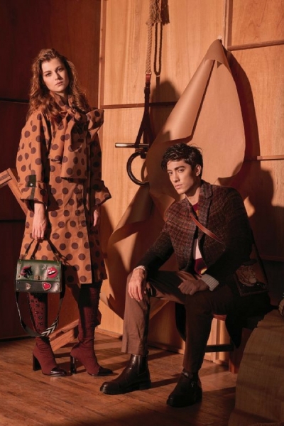 Him - Attire by Etro and Bally, Her - Attire by Louwe, Bag by Bally Image