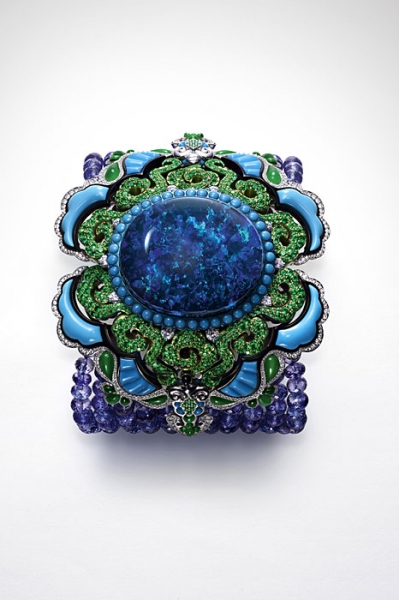 Chopard Red Carpet collection Secret Watch featuring a black opal and set with carved jadeite, turquoises and onyx Image