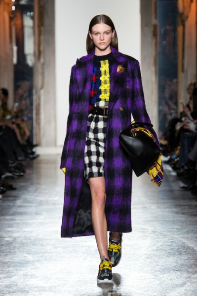 Dazzle in this purple overcoat from Versace Image