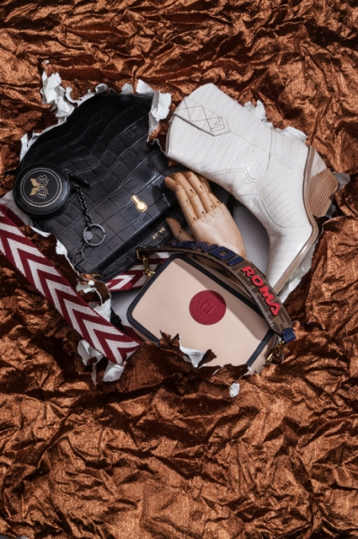 Leather bag charm by Bottega Veneta, Cecyle SM.C crossbody bag by Bally, Catwalk cowboy boot, Fendi Stamp camera bag with mini Strap You strap by Fendi Image