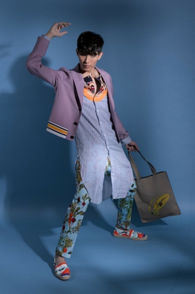 Jacket with long tunic shirt by Loewe; Printed trousers by Dolce & Gabbana; Printed espadrilles by Paul Smith; Fendi Banana tote by Fendi Image