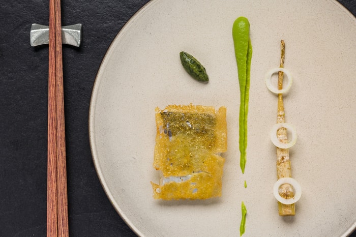 Pan-fried hairtail, baby corn and French green pea