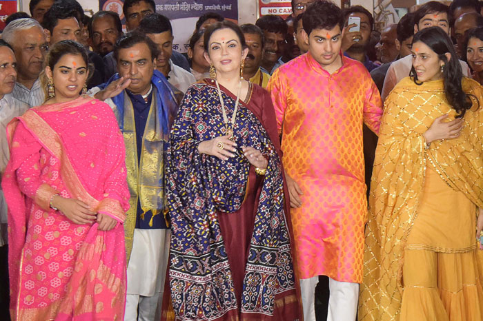 Mukesh Ambani with his wife and three children