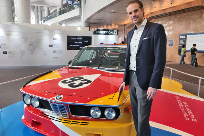 Martijn Oremus with BMW Art Car No1 at Art Basel Hong Kong