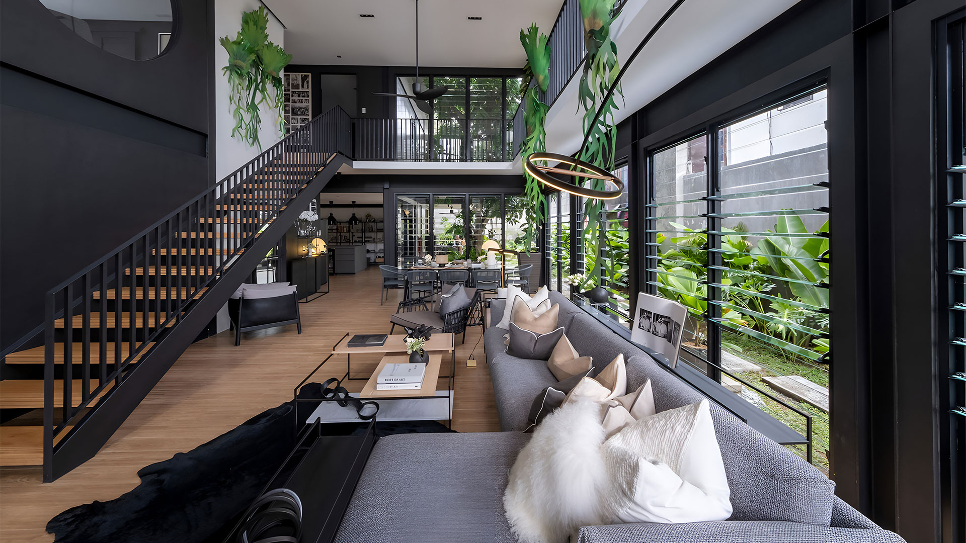 Brutal Beauty: Stark modernism is softened by nature – including an indoor tree – in this tranquil Manila house 